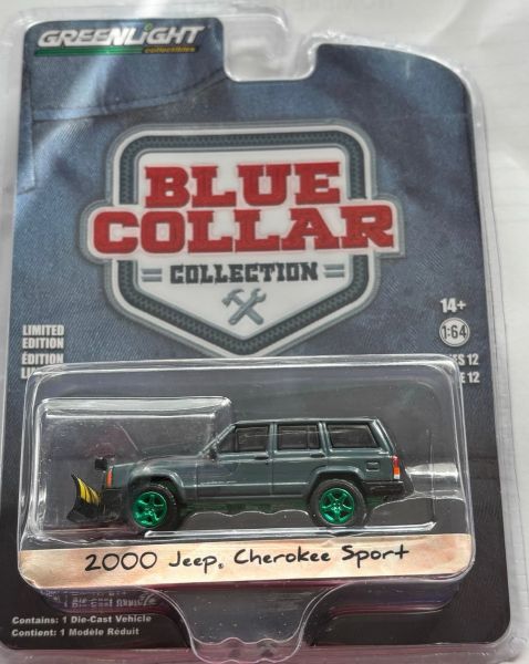 GREEN35260-E_VERT - JEEP Cherokee sport 2000 with snowplough and green rims from the BLUE COLLAR series in blister pack - 1