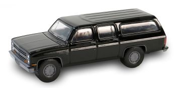 GREEN28150-D - CHEVROLET Suburban C10 custom deluxe 1985 black from the BLACK BANDIT series in blister pack