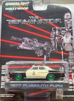 GREEN62020-AVERT - PLYMOUTH Fury 1977 Police with green wheels from the film TERMINATOR blister carded